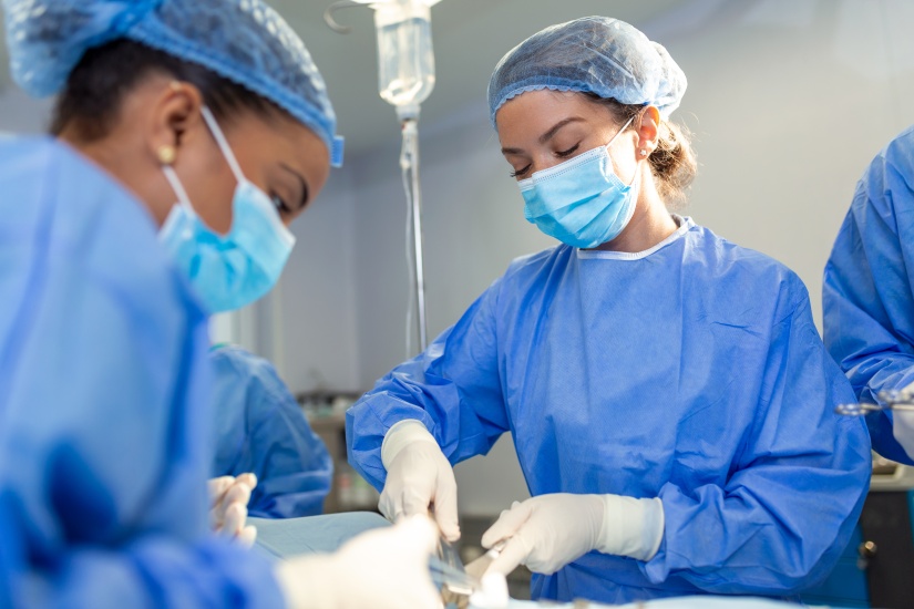 doctors performing fibroid removal surgery